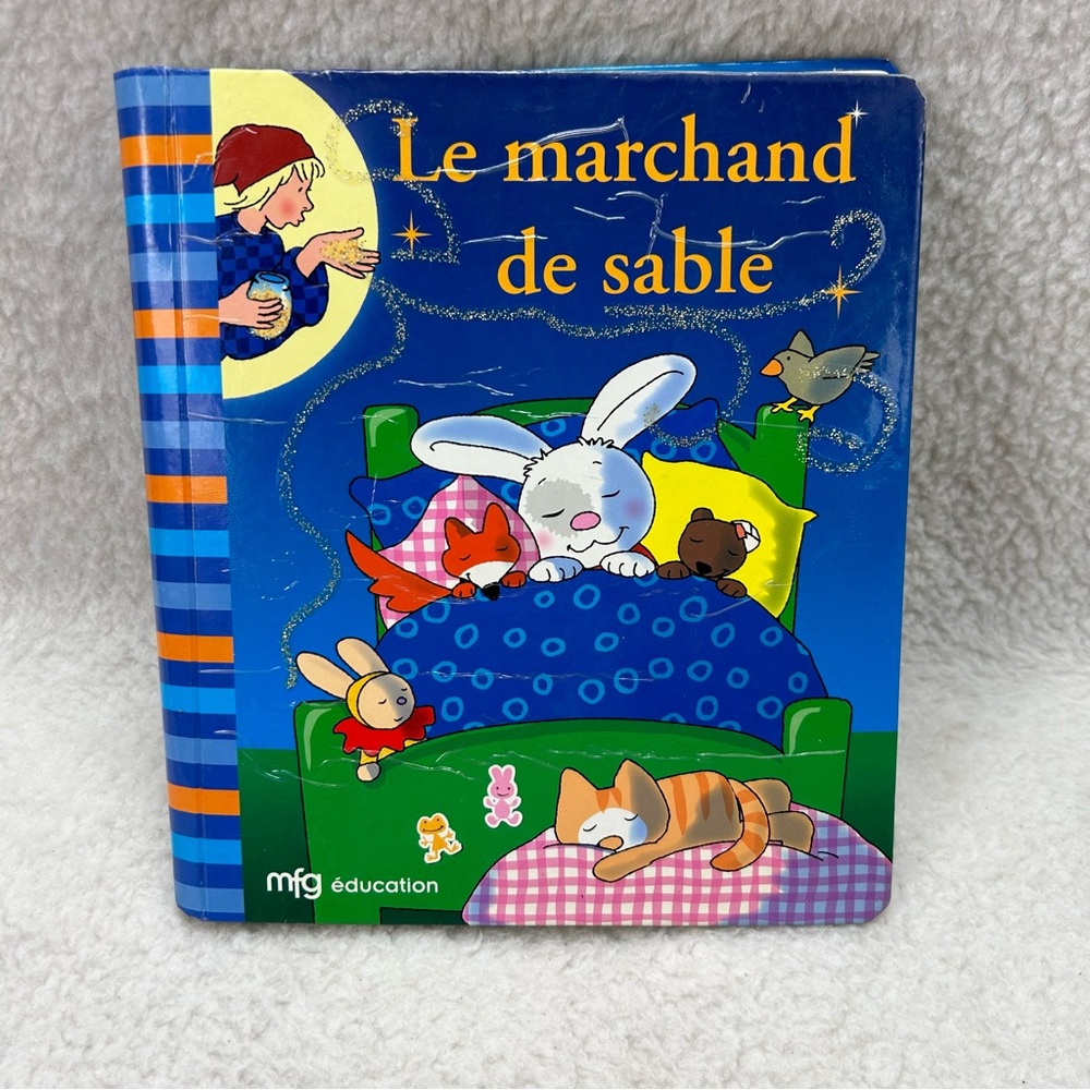 Kids book Le Marchand de sable French edition spiral-bound USED condition